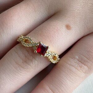 Elegant ruby and gold Infinity Ring